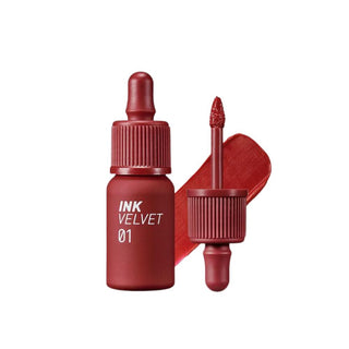 peripera's Ink The Velvet Lip Tint in color 01 Good Brick, displayed with its doe-foot applicator, which resembles a dropper but is not functional as one. It also includes a swatch of the color.