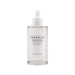 SKIN1004's Madagascar Centella Tone Brightening Capsule Ampoule in a 100 ml (3.38 fl oz) dropper bottle.