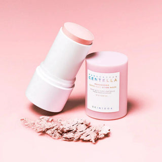 SKIN1004's Madagascar Centella Poremizing Quick Clay Stick Mask with the cap off, revealing the smooth clay surface ready for easy application to target pores.