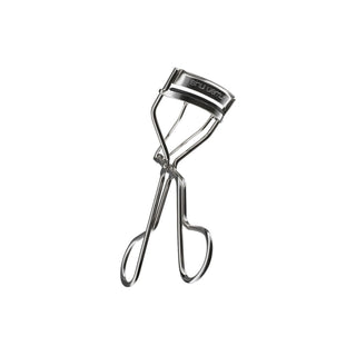 shu uemura's Iconic Eyelash Curler with a mushroom shape, designed for precise curling.