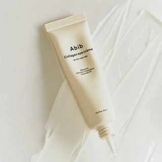 Abib's Collagen Eye Creme Jericho Rose with the cap off, showing the dropper tip.