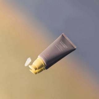 haruharu wonder's Black Rice Pure Mineral Relief Daily Sunscreen SPF 50+ PA++++, with a small amount of the white, creamy sunscreen dispensed.