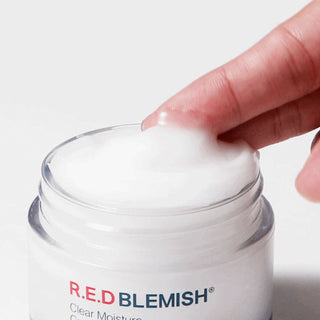 Closeup of Dr. G's R.E.D Blemish Clear Soothing Cream highlighting its light gel texture.