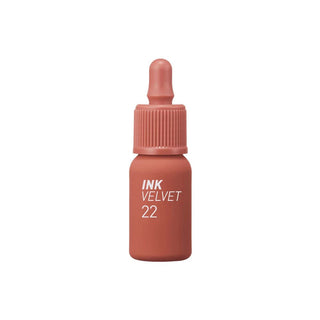 peripera's Ink The Velvet Lip Tint in color 22 Bouquet Nude, shown in a dropper bottle design, though the dropper is not functional.