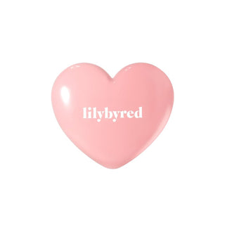 lilybyred's Luv Beam Cheek in 06 Fluffy Peach, with heart-shaped packaging in peach.