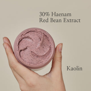 Beauty of Joseon's Red Bean Refreshing Pore Mask is shown up close to highlight its texture. It contains 30% Haenam Red Bean Extract and Kaolin.