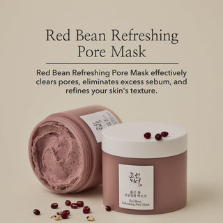 Beauty of Joseon's Red Bean Refreshing Pore Mask is shown with the lid off, revealing a moist clay texture. The mask effectively clears pores, eliminates excess sebum, and refines your skin's texture.