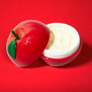 The container of TONYMOLY's Red Apple Hand Cream is open, revealing its rich, custard-like texture.