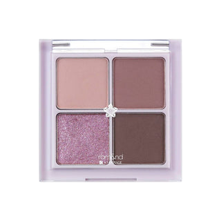 rom&nd's eyeshadow palette 02 Dry Violet with four shades arranged as follows: Ash Violet in the top left, Violet Purple in the top right, Sparking Purple in the bottom left, and Mood Violet in the bottom right.