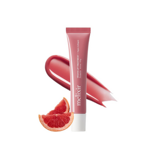 Melixir Pink lip treatment tube with a swatch of color and a slice of grapefruit on a white background to indicate color: Pomelo