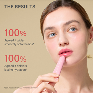 Woman holding a melixir pink lip treatment with results about product performance on a beige background