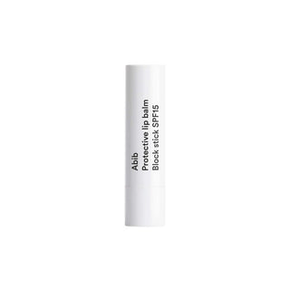 Abib's Protective Lip Balm Block Stick SPF 15 in a white tube.