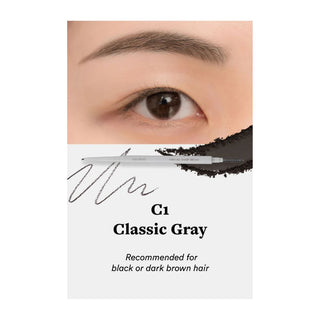 rom&nd's Han All Sharp Brow Dual Sided Pencil in Classic Gray, shown on a model’s eyebrow. The pencil is recommended for black or dark brown hair. Includes a swatch of the product for color reference.