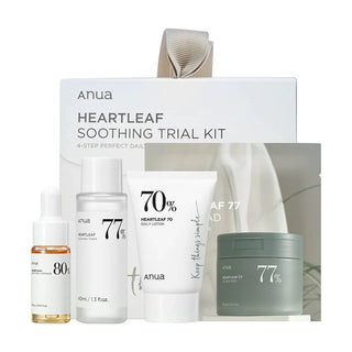 Anua's Heartleaf Soothing Trial Kit includes Heartleaf 77 Clear Pad, Heartleaf 77% Soothing Toner in a 40ml bottle, Heartleaf 80% Soothing Ampoule in a 10ml dropper bottle, and Heartleaf 70 Daily Relief Lotion in a 20ml tube.