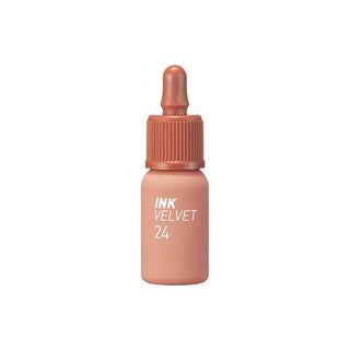 peripera's Ink The Velvet Lip Tint in color 24 Milky Nude, shown in a dropper bottle design, though the dropper is not functional.