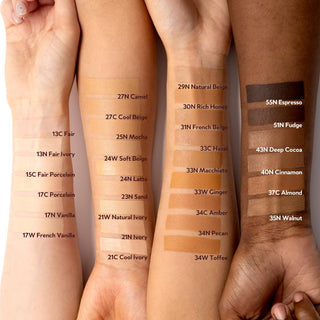 Swatches of the foundation on four skin tones: Fair/light with 13C Fair, 13N Fair Ivory, 15C Fair Porcelain, 17C Porcelain, 17N Vanilla, 17W French Vanilla; Medium with 27N Camel, 27C Cool Beige, 25N Mocha, 24W Soft Beige, 24N Latte, 23N Sand, 21W Natural Ivory, 21N Ivory, 21C Cool Ivory; Tan with 29N Natural Beige, 30N Rich Honey, 21N French Beige, 33C Hazel, 33N Macchiato, 33W Ginger, 34C Amber, 34N Pecan, 34W Toffee; Deep with 55N Espresso, 51N Fudge, 43N Deep Cocoa, 40N Cinnamon, 37C Almond, 35W Walnut.