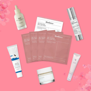 Mother-in-Law Magic Set by PlayLab Beauty includes VT Reedle Shot 100, Abib Jericho Rose Bifida Serum Firming Drop, BioDance Bio-Collagen Real Deep Mask, Mixsoon Bean Essence, Beauty of Joseon Revive Eye Serum: Ginseng + Retinol, and ROUND LAB Birch Juice Moisturizing Sunscreen SPF 50+ PA++++.